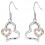 Boucles d'oreilles oxyde de zirconium 2 coeurs fusionnés argenté Couleur Orange