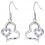 Boucles d'oreilles oxyde de zirconium 2 coeurs fusionnés argenté Couleur Violet