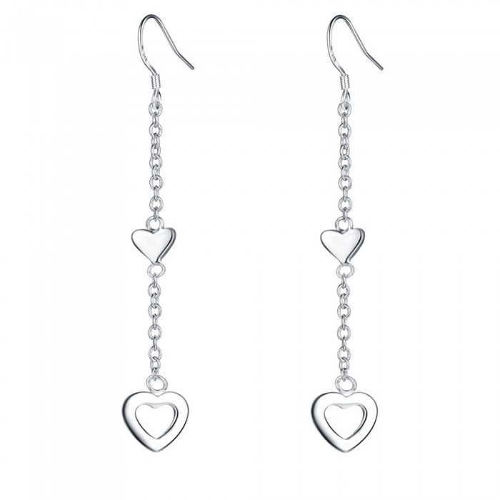 Boucles d'oreilles deux coeurs plein et creux argenté