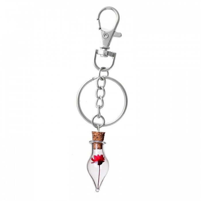 Porte-clés bijou de sac argenté fiole bouteille en verre et sa fleur rouge