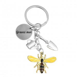 Porte-clés jardinier abeille pelle arrosoir argenté gravure personnalisée sur médaille