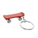 Porte-clés skateboard planche à roulettes à 4 roues rouge argenté