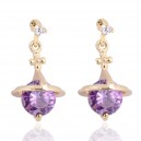 Boucles d'oreilles fleur cloche oxyde de zirconium violet doré