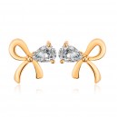 Boucles d'oreilles noeud papillon oxyde de zirconium doré