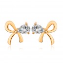 Boucles d'oreilles noeud papillon oxyde de zirconium doré